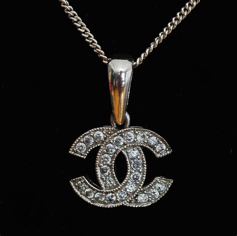 chanel logo necklace price|Chanel long necklace with logo.